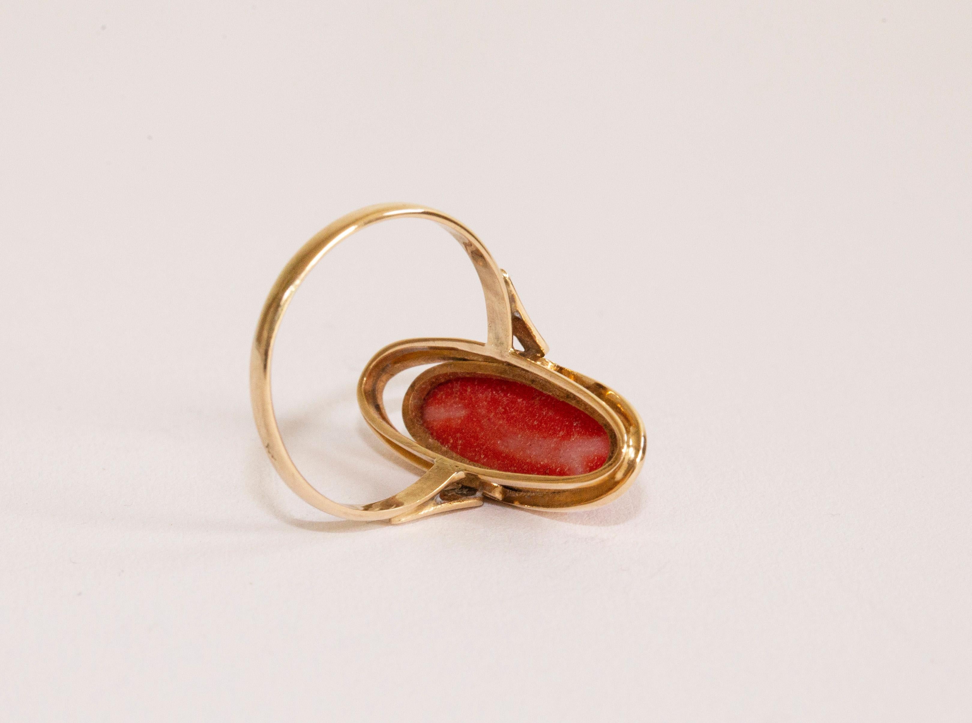 Contemporary 14 Karat Yellow Gold Ring with Oval Cut Natural Red Coral