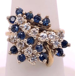 14 Karat Gelbgold Ring mit Saphir- und Diamant-Cluster