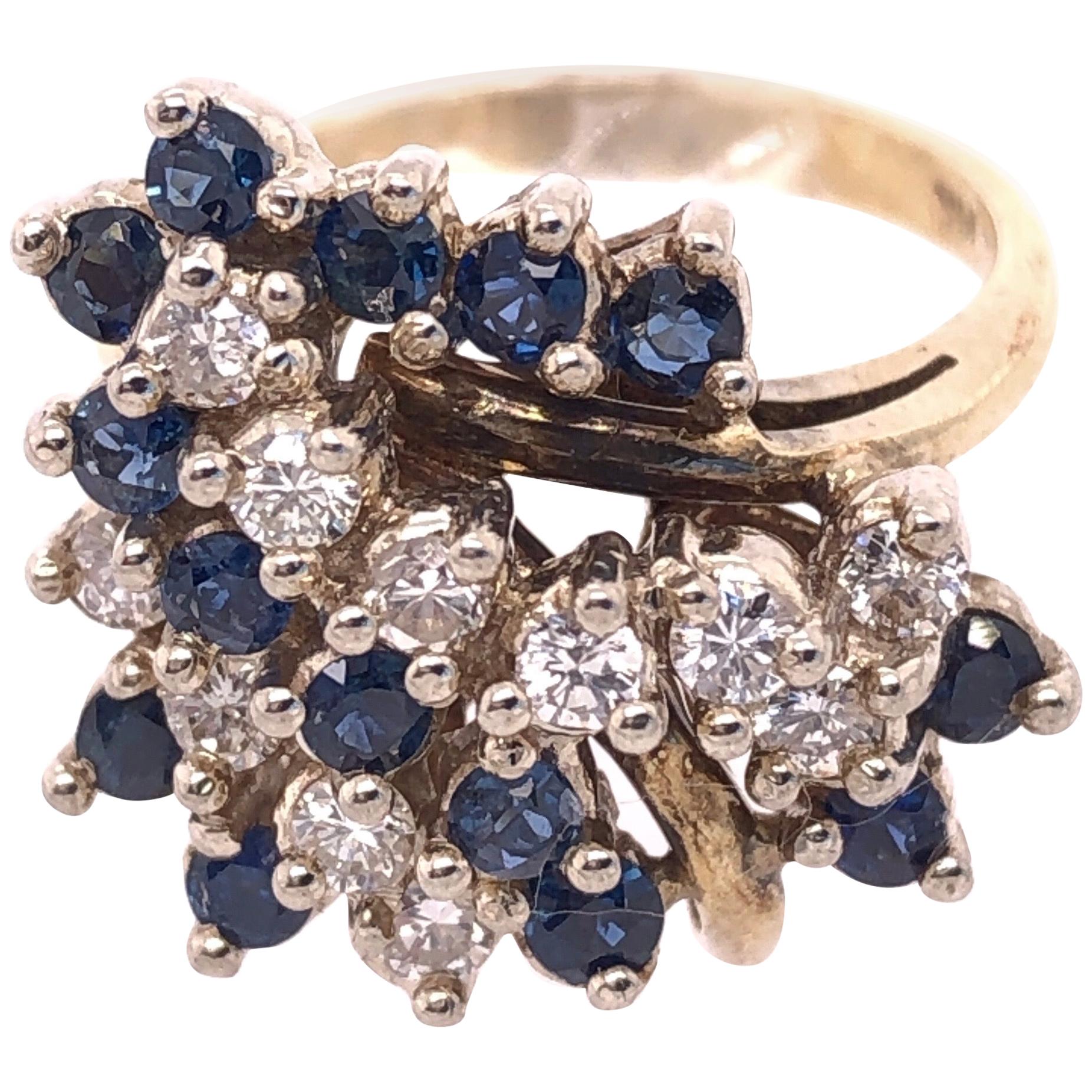 14 Karat Yellow Gold Ring with Sapphire and Diamond Cluster For Sale