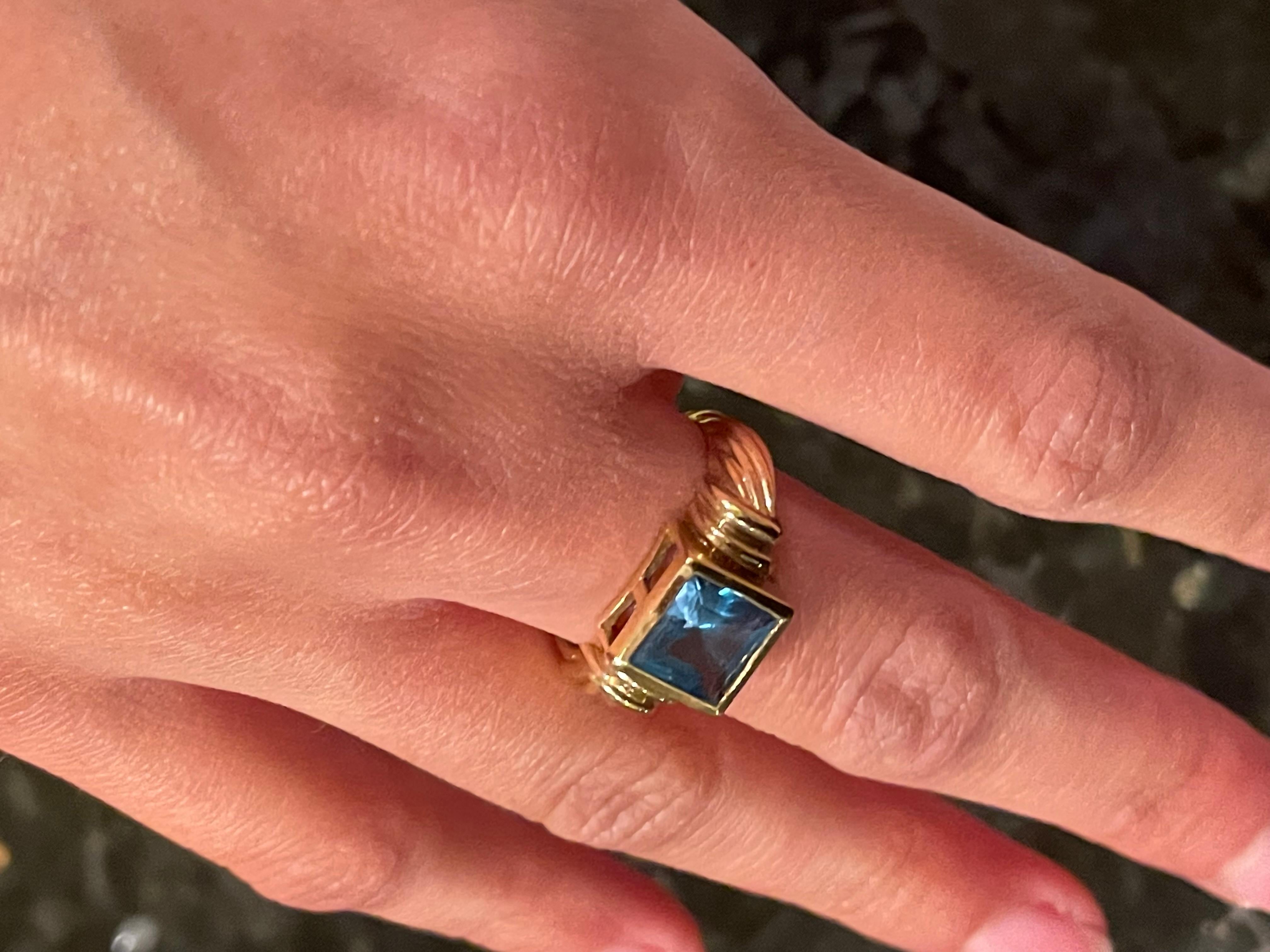 14 Karat Yellow Gold Ring with Solitaire Center Aquamarine Emerald Cut For Sale 3