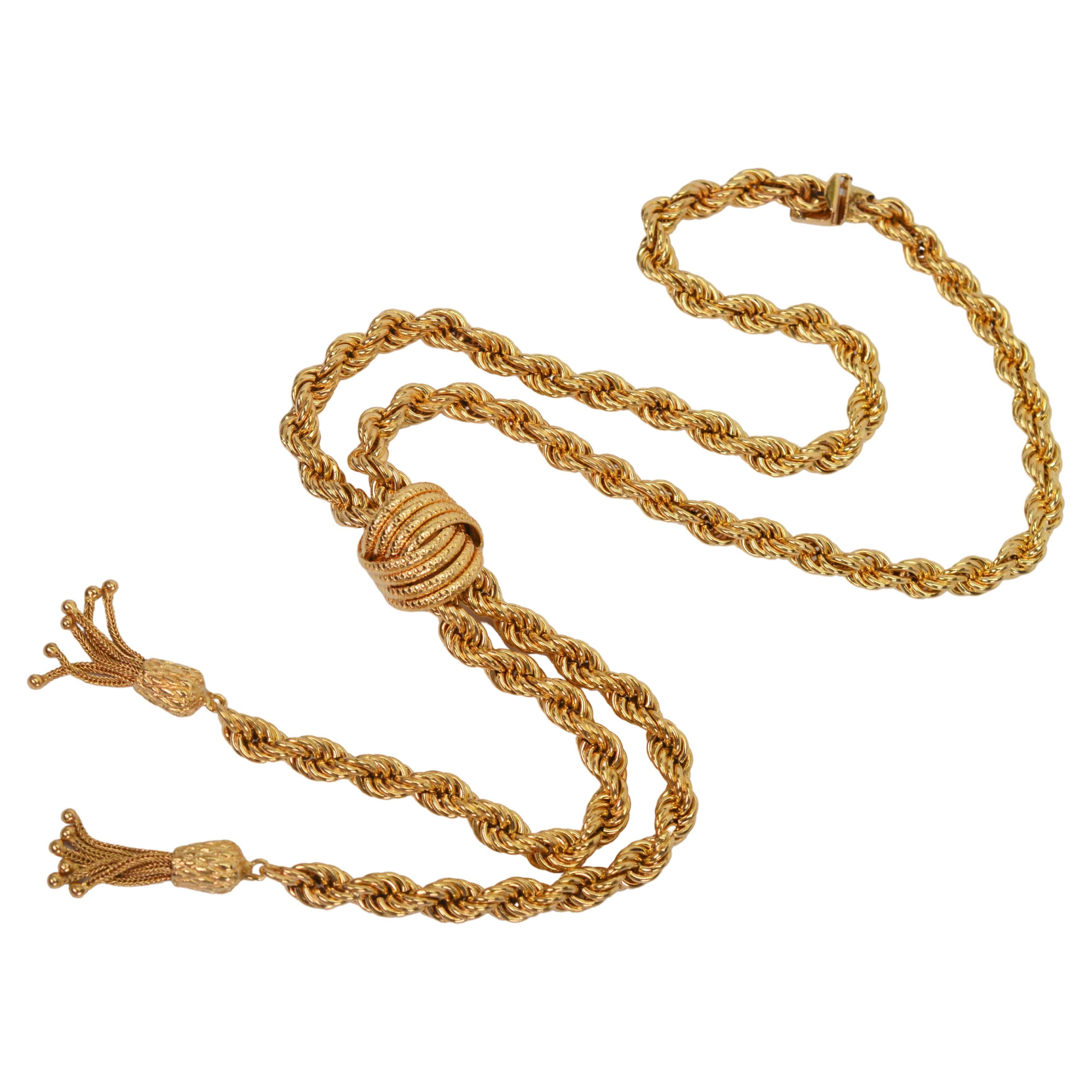 Fashionable and bright, this bold fourteen 14 karat yellow gold necklace is the perfect accessory to dress up a starched collared blouse, fine gauge sweater or classic dress.
Generously styled gold rope at a thickness of approximately 6.5 mm is