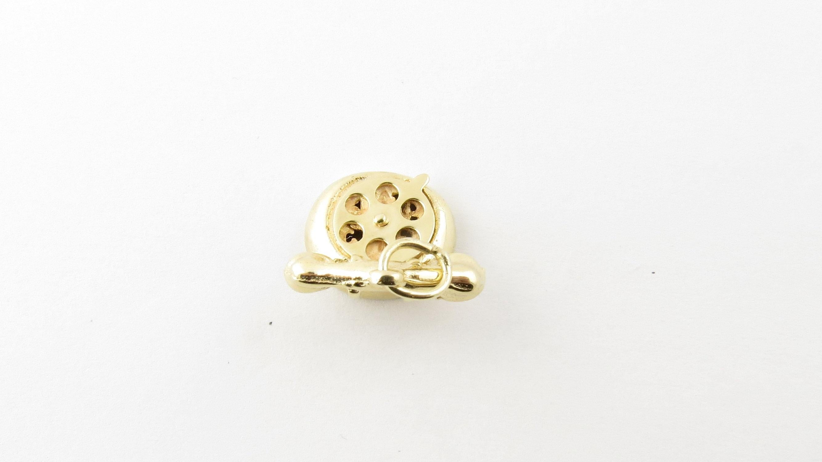 Vintage 14 Karat Yellow Gold Rotary Dial Telephone Charm- Go back to a simpler time! This lovely 3D charm features a miniature telephone with moving rotary dial meticulously detailed in 14K yellow gold. Size: 12 mm x 15 mm (actual charm) Weight: 1.5
