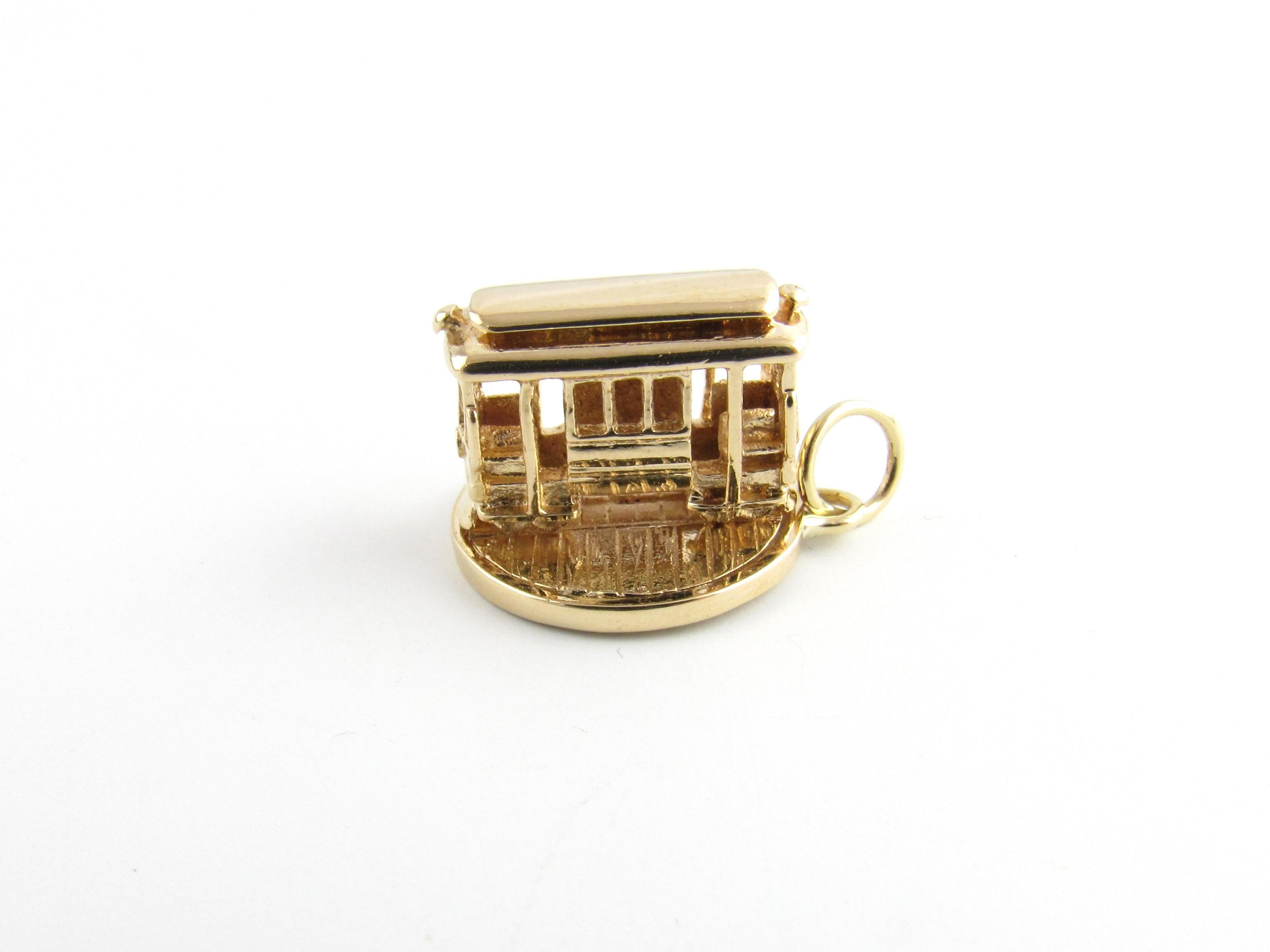 Vintage 14 Karat Yellow Gold Rotating Trolley Car Charm-

Take a ride on the cable car!

This lovely 3D charm features a miniature cable car that rotates on its base. Beautifully detailed in 14K yellow gold.

Size: 12 mm 16 mm (actual