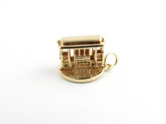 14 Karat Yellow Gold Rotating Trolley Car Charm