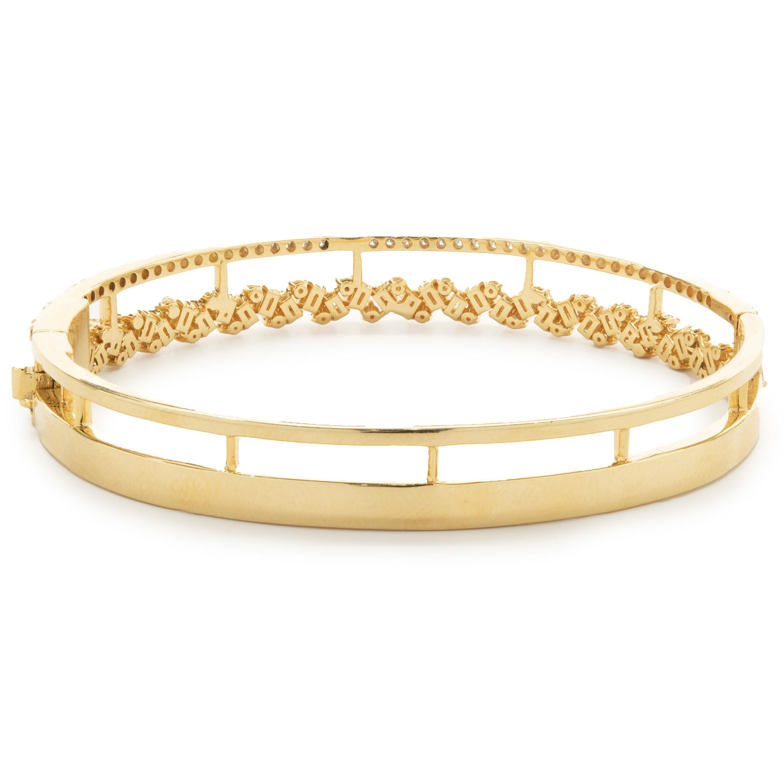Designer: custom design
Material: 18K yellow gold
Diamonds: round brilliant & baguette cut = 1.92cttw
Color: G 
Clarity: VS2
Dimensions: bracelet will fit up to a 7.5-inch wrist
Weight: 21.15 grams