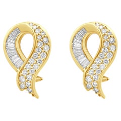 14 Karat Yellow Gold Round and Baguette Cut Diamond Ribbon Earrings