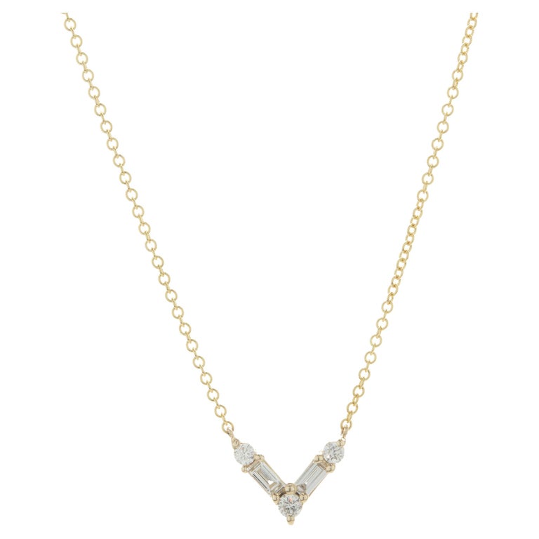 14 Karat Yellow Gold Round and Baguette Cut Diamond V Necklace For Sale at 1stDibs