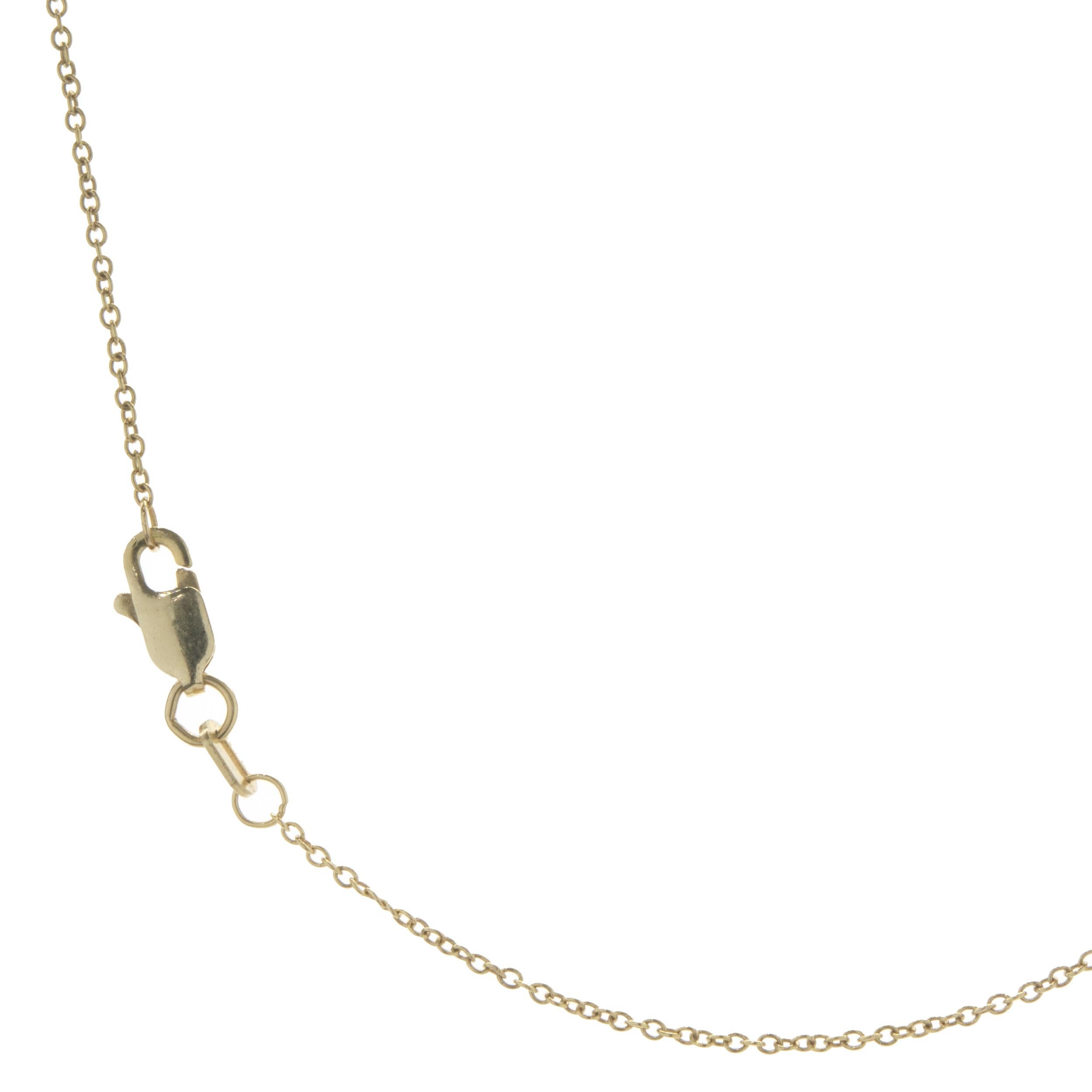 Taglio rotondo Collana Malocchio in oro giallo 14 carati con diamanti tondi e baguette e zaffiri in vendita