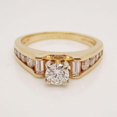14 Karat Yellow Gold Round and Baguette Diamond Engagement Ring