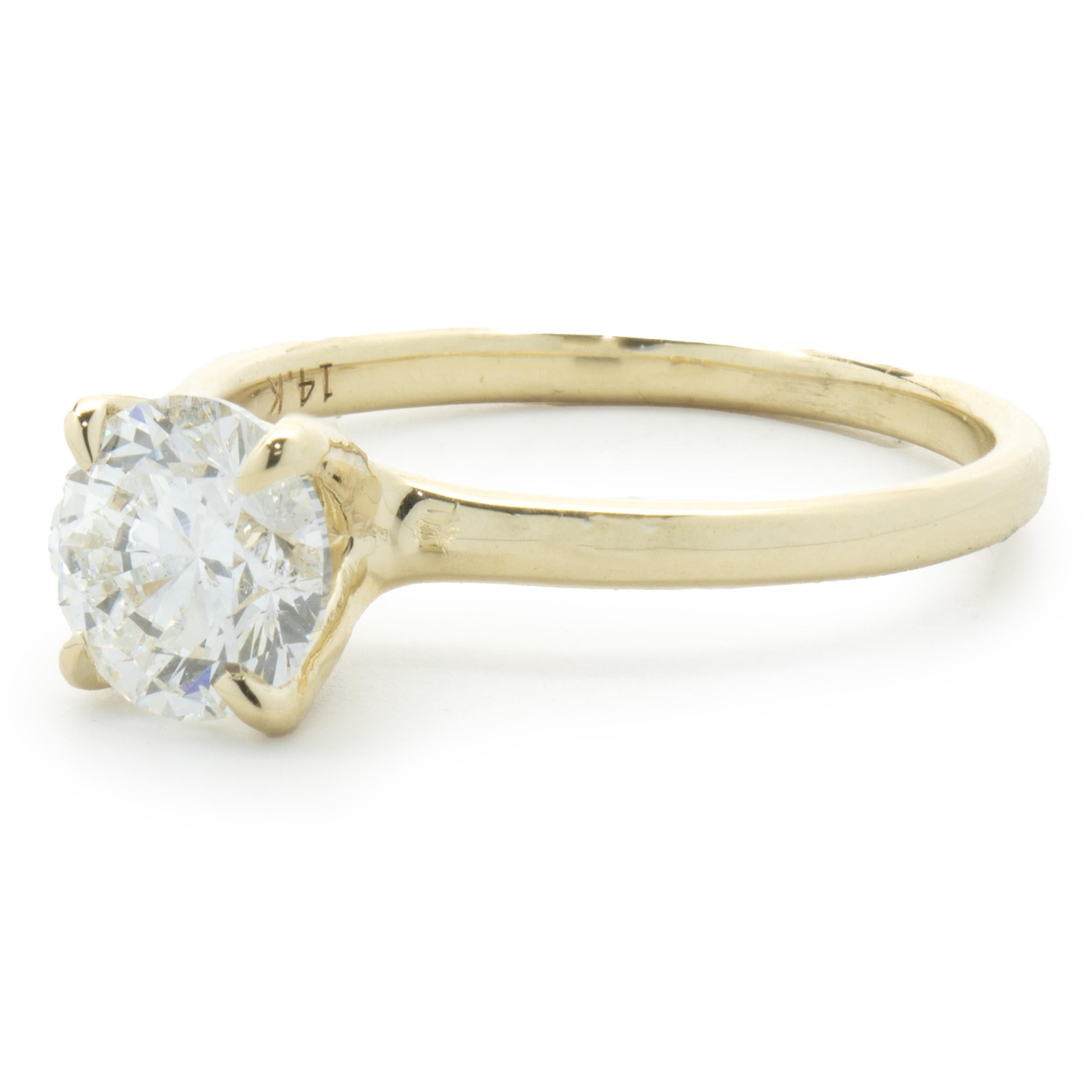 Designer: Custom
Material: 14K yellow gold
Diamond: 1 round brilliant cut = 1.21ct
Color: E
Clarity: I1
GIA: 2231068243
Dimensions: ring top measures 1.9mm wide
Ring Size: 6.75 (complimentary sizing available)
Weight: 2.45 grams