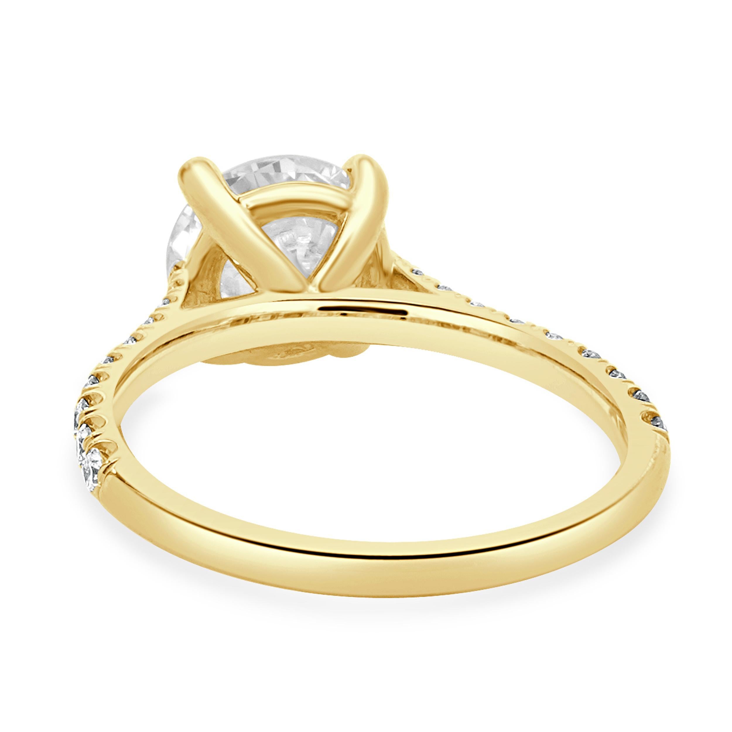 Verlobungsring aus 14 Karat Gelbgold mit rundem Diamanten im Brillantschliff (Rundschliff) im Angebot