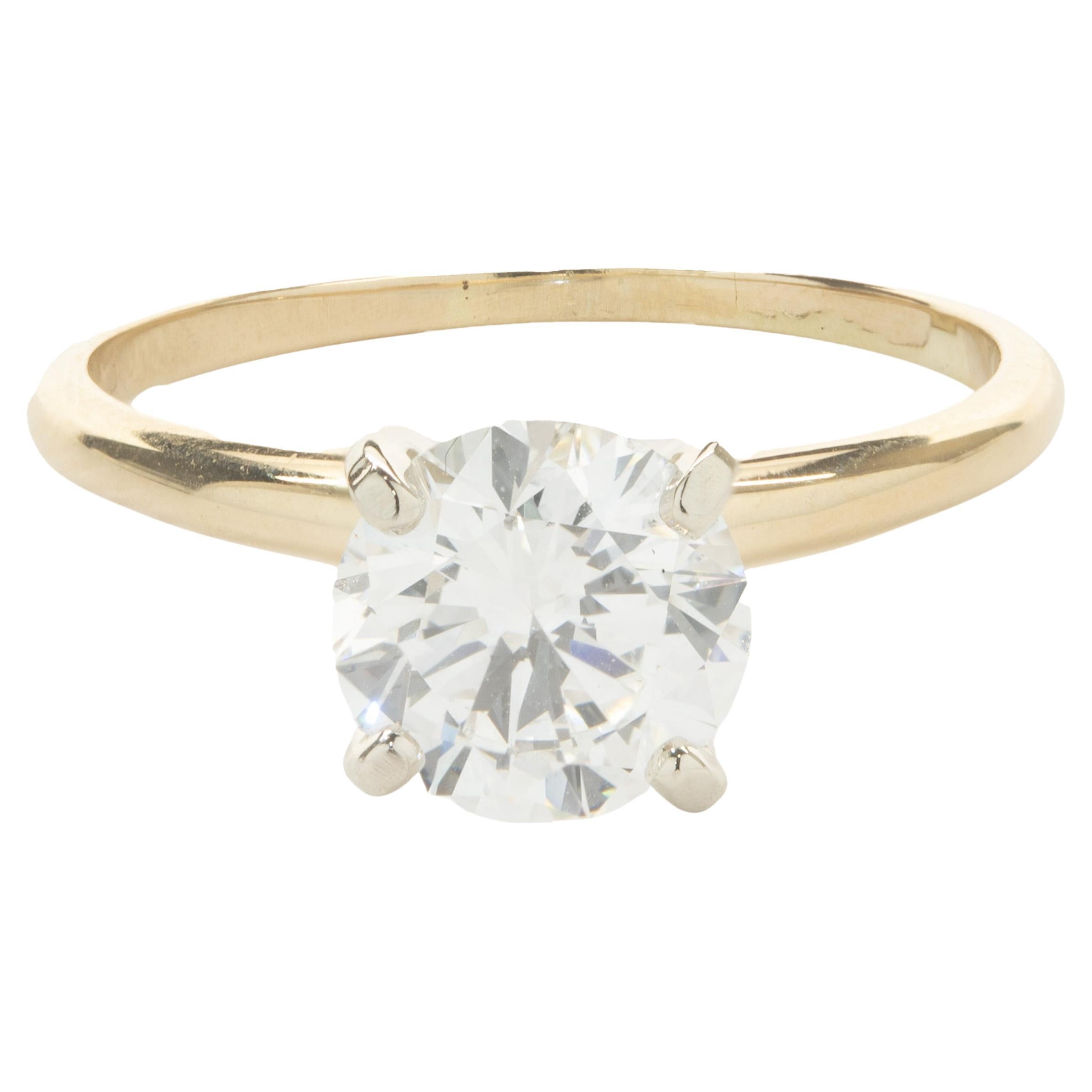 Anello di fidanzamento con diamante taglio brillante rotondo in oro giallo 14 carati