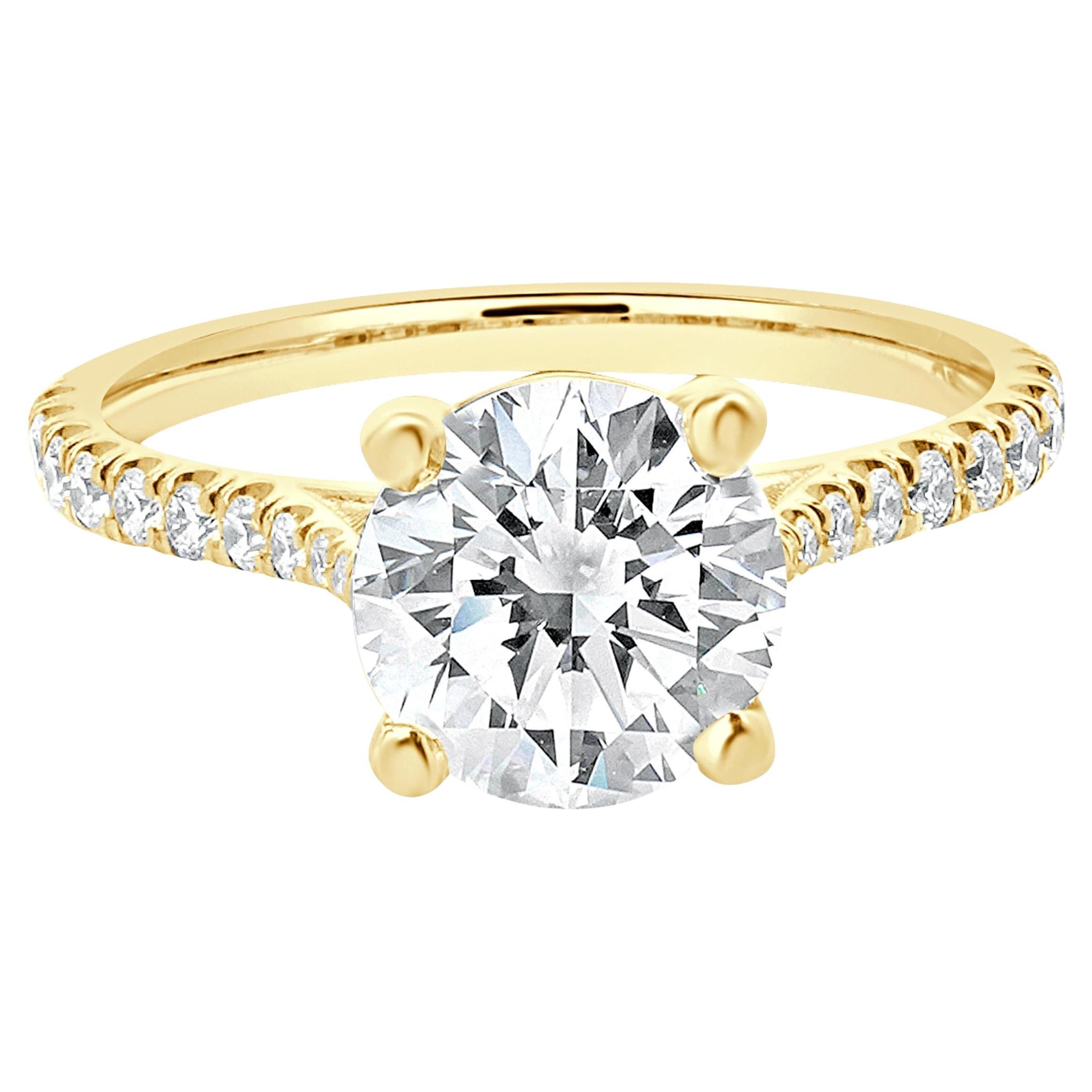 Verlobungsring aus 14 Karat Gelbgold mit rundem Diamanten im Brillantschliff