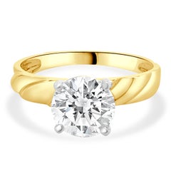 Verlobungsring aus 14 Karat Gelbgold mit rundem Diamanten im Brillantschliff