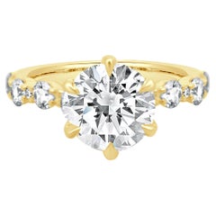 Verlobungsring aus 14 Karat Gelbgold mit rundem Diamanten im Brillantschliff