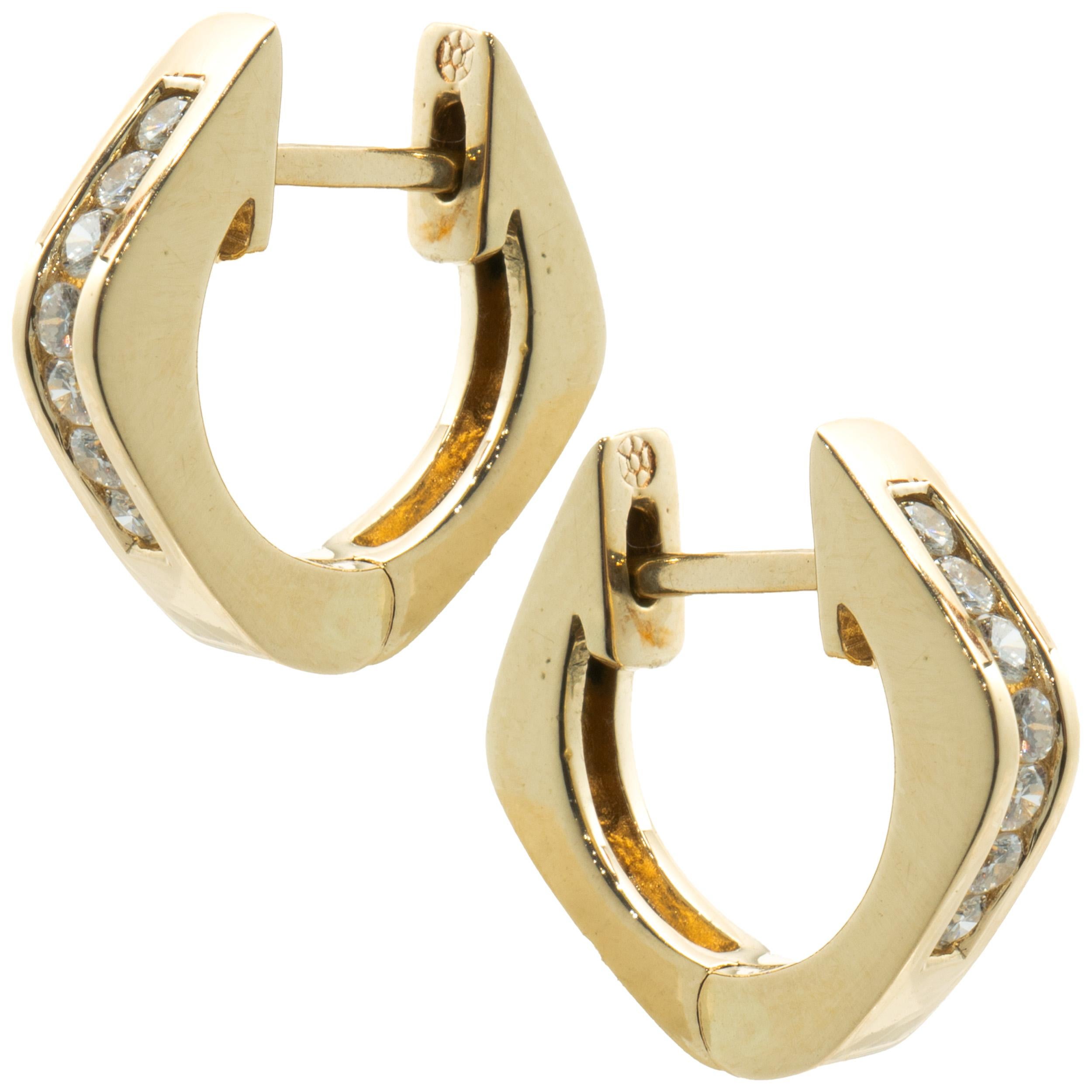 Material: 14k yellow Gold
Diamonds: 14 round brilliant cut = 0.21cttw
Color: H
Clarity: SI1-2
Dimensions: earrings measure approximately 5/8” in diameter
Fastenings: snapbacks
Weight: 3.95 grams
