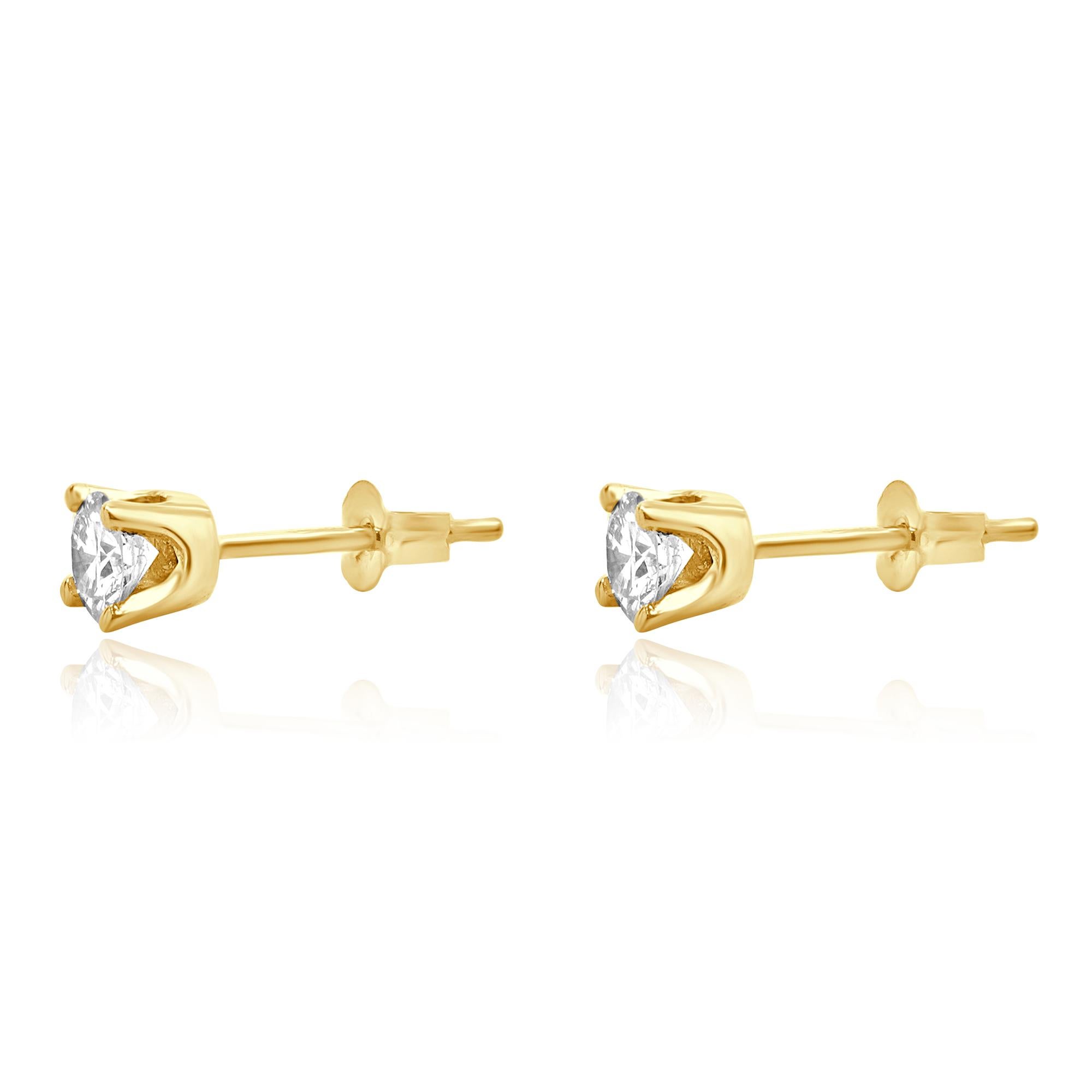 Matériau : Or jaune 14K
Diamants : 2 diamants ronds de taille brillant = 0,30cttw
Couleur : G
Clarté : VS2
Dimensions : les boucles d'oreilles mesurent environ 3.4 mm de diamètre.
Fermetures : dos à friction
Poids : 0,56 grammes