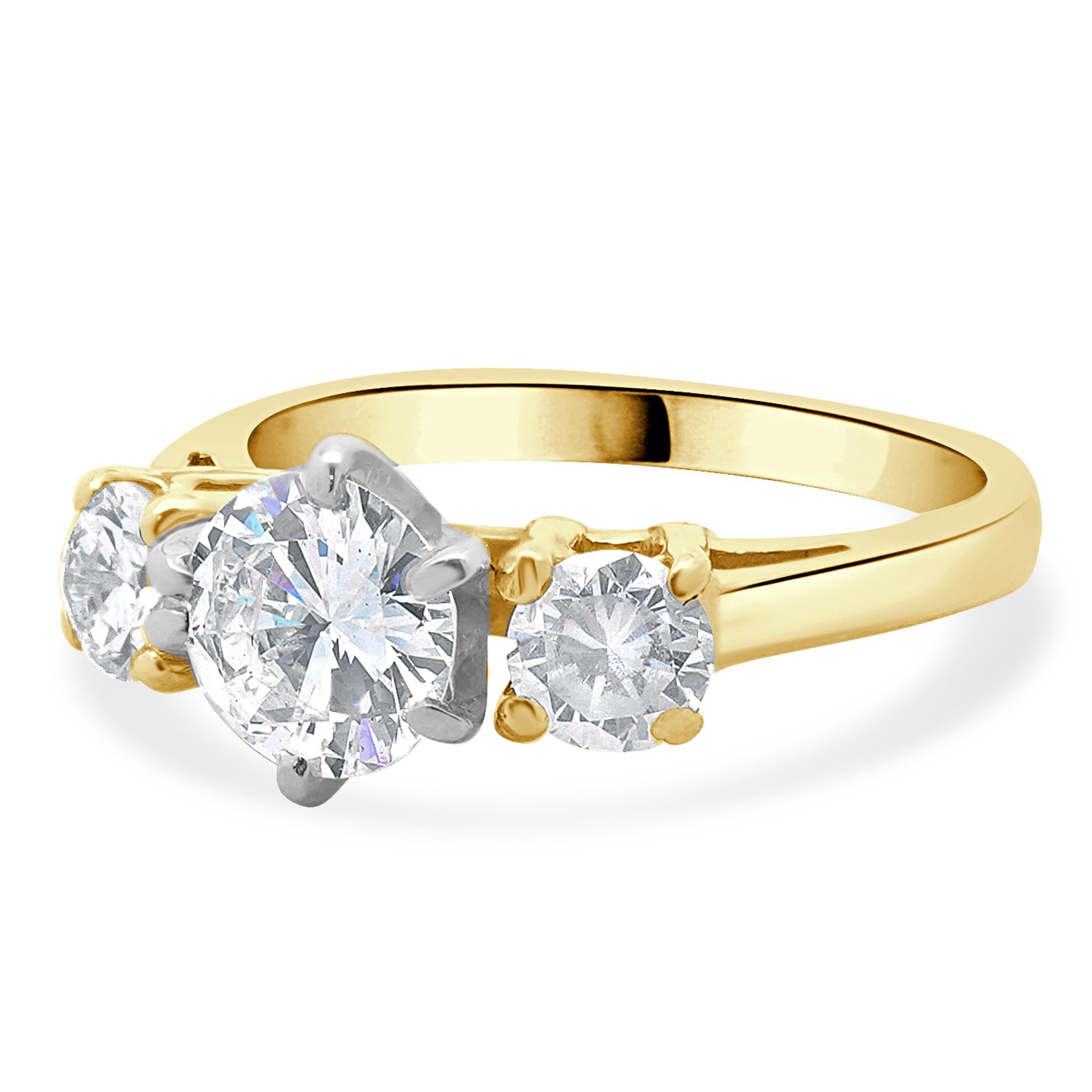 Designer: custom design
Material: 14K yellow gold
Center Diamond: 1 round brilliant cut = 0.80ct
Color : G
Clarity : VS2
Diamond: 2 round brilliant cut = 0.40cttw
Color : G
Clarity : SI1
Dimensions: ring top measures 7.5mm
Size: 4.25 complimentary
