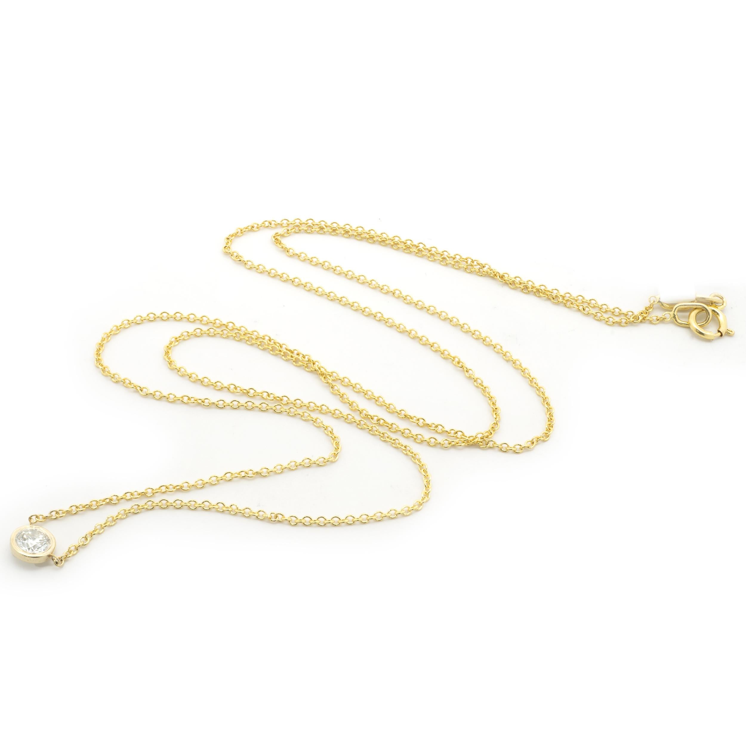 Designer: custom design
Material: 14K yellow gold
Diamonds: 1 round brilliant cut = 0.17cttw
Color: G
Clarity: SI1
Dimensions: necklace measures 16-inches in length 
Weight: 1.37 grams

