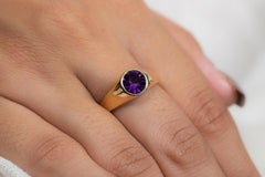 Unisex- Solitärring aus 14 Karat Gelbgold mit Amethyst im Rundschliff