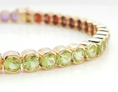 Armband aus 14 Karat Gelbgold Rundschliff Topas Granat Citrin Amethyst Peridot
