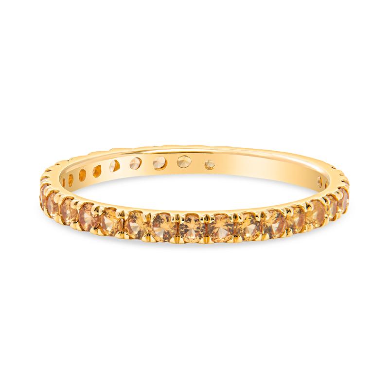 This band features 0.65 carat total weight in round natural yellow sapphires set in 14 karat yellow gold. Wear alone or layer with your other favorite bands. It is a size 7 but can be resized upon request.
