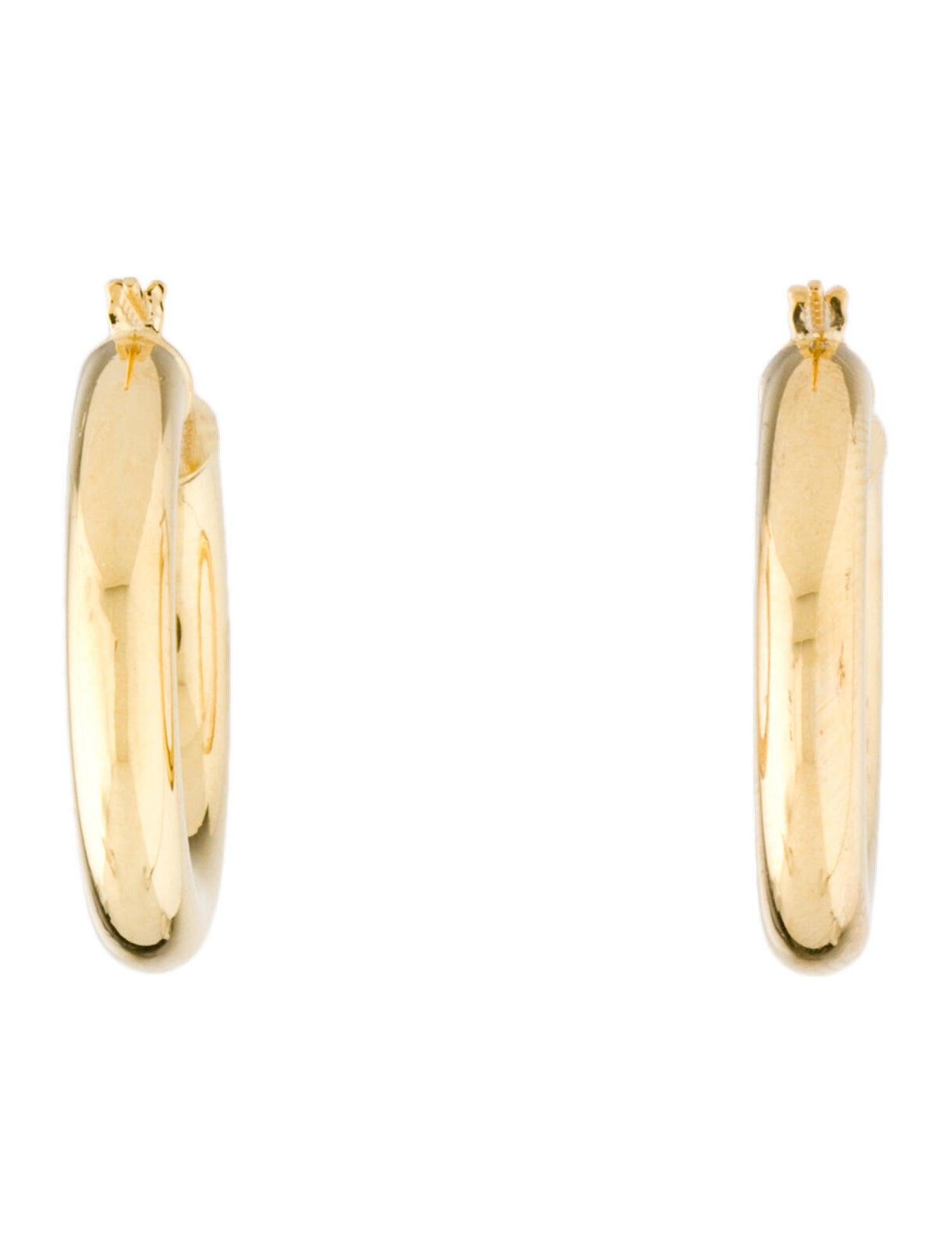 These Elegant and Stylish 14K Yellow Gold Hoop Earrings will add that perfect Glam to your look! Earring Measurements are 4 MM thick and the diameter is 15MM. 
Made in Italy. 
15MM Diameter.  
Gift Box Included.