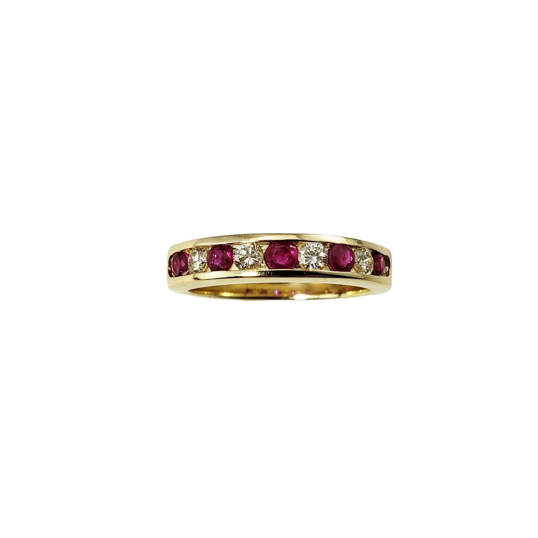 Vintage 14 Karat Yellow Gold Lab Created Ruby and Diamond Band Ring Size 6.5-

This lovely band features four oval lab created rubies and four round brilliant cut diamonds set in classic 14K yellow gold.  Width:  4 mm.

Approximate total diamond