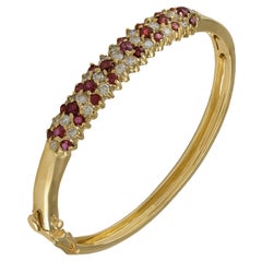 Pulsera de oro amarillo de 14 quilates con rubíes y diamantes