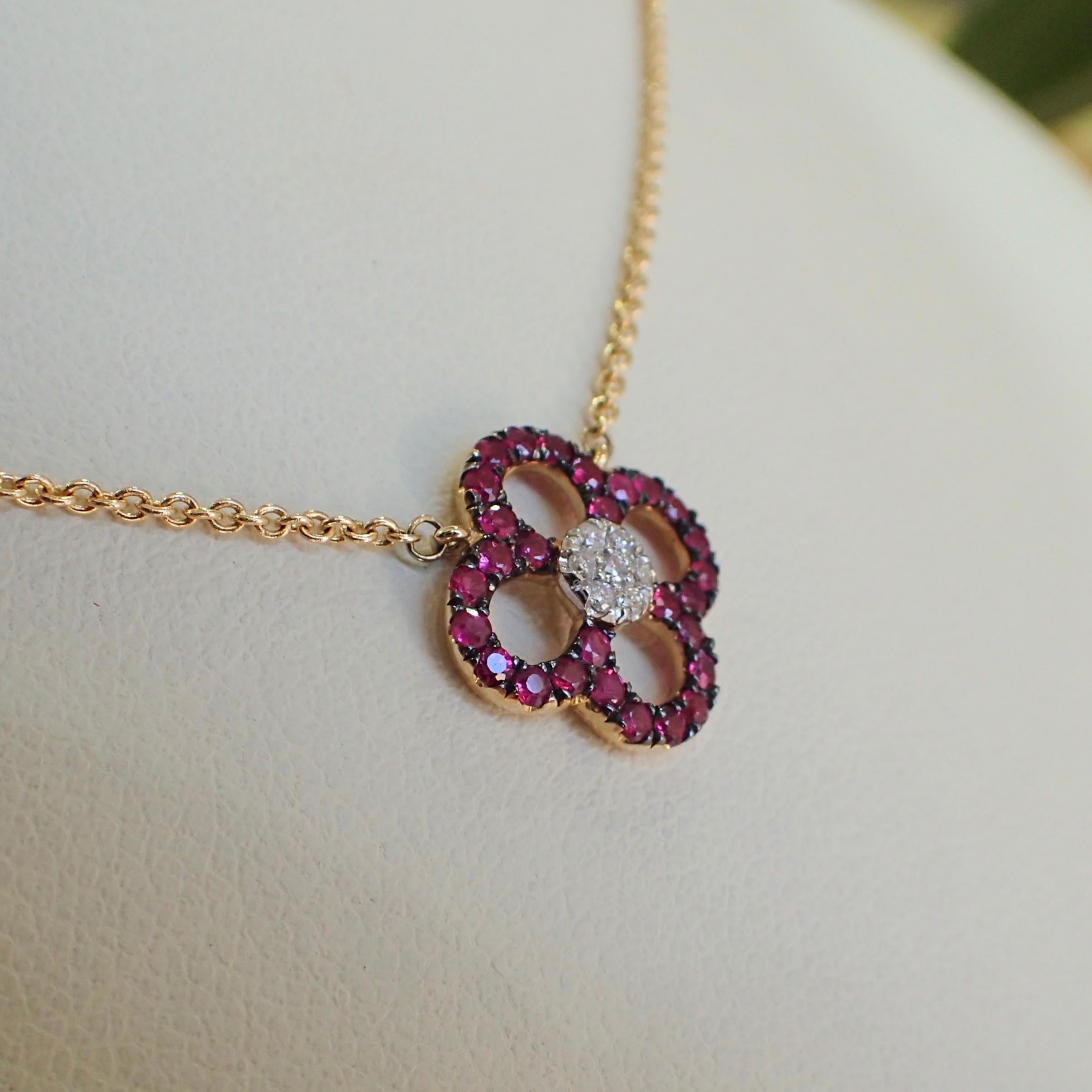 Round Cut 14 Karat Yellow Gold Ruby and Diamond Flower Pendant Hangs from Cable Chain
