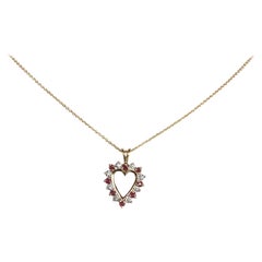 14 Karat Yellow Gold Ruby and Diamond Heart Pendant Necklace
