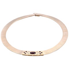 14 Karat Yellow Gold Ruby and Diamond Omega Necklace