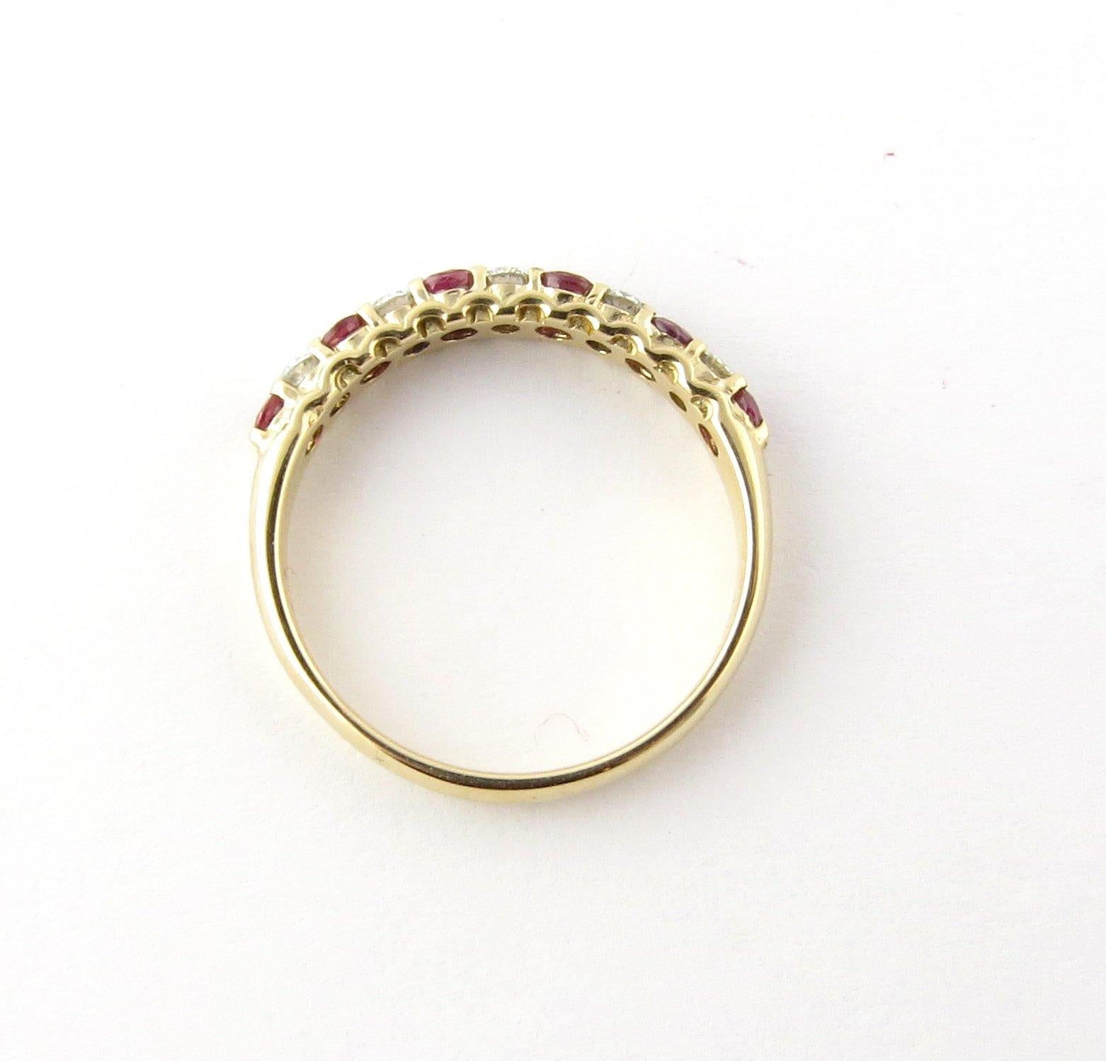Vintage 14 Karat Yellow Gold Ruby and Diamond Ring Size 6.25

This stunning ring features five round brilliant cut diamonds and six round rubies set in meticulously detailed 14K yellow gold. Shank measures 2 mm.

Approximate total diamond weight: