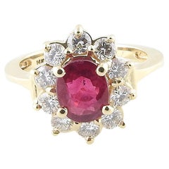 14 Karat Yellow Gold Ruby and Diamond Ring 14 Karat Yellow Gold Ruby and Diamond Ring