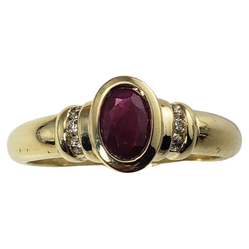 14 Karat Yellow Gold Ruby and Diamond Ring For Sale