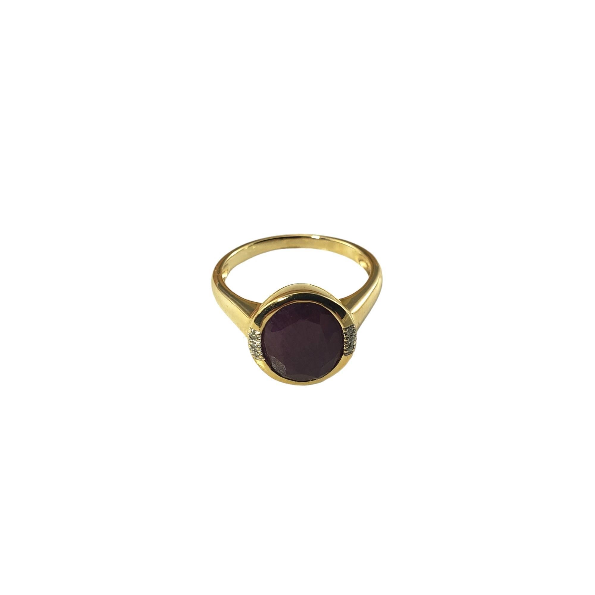 14 Karat Yellow Gold Ruby and Diamond Ring Size 8 JAGi Certified-

This elegant ring features one oval ruby (11.2 mm x 9.3 mm) and six round brilliant cut diamonds set in classic 14K yellow gold.  Shank: 2 mm. 

Ruby weight: 4.31 ct.  

Approximate