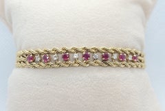 Bracelet corde en or jaune 14 carats, rubis et diamants, 17,3 grammes