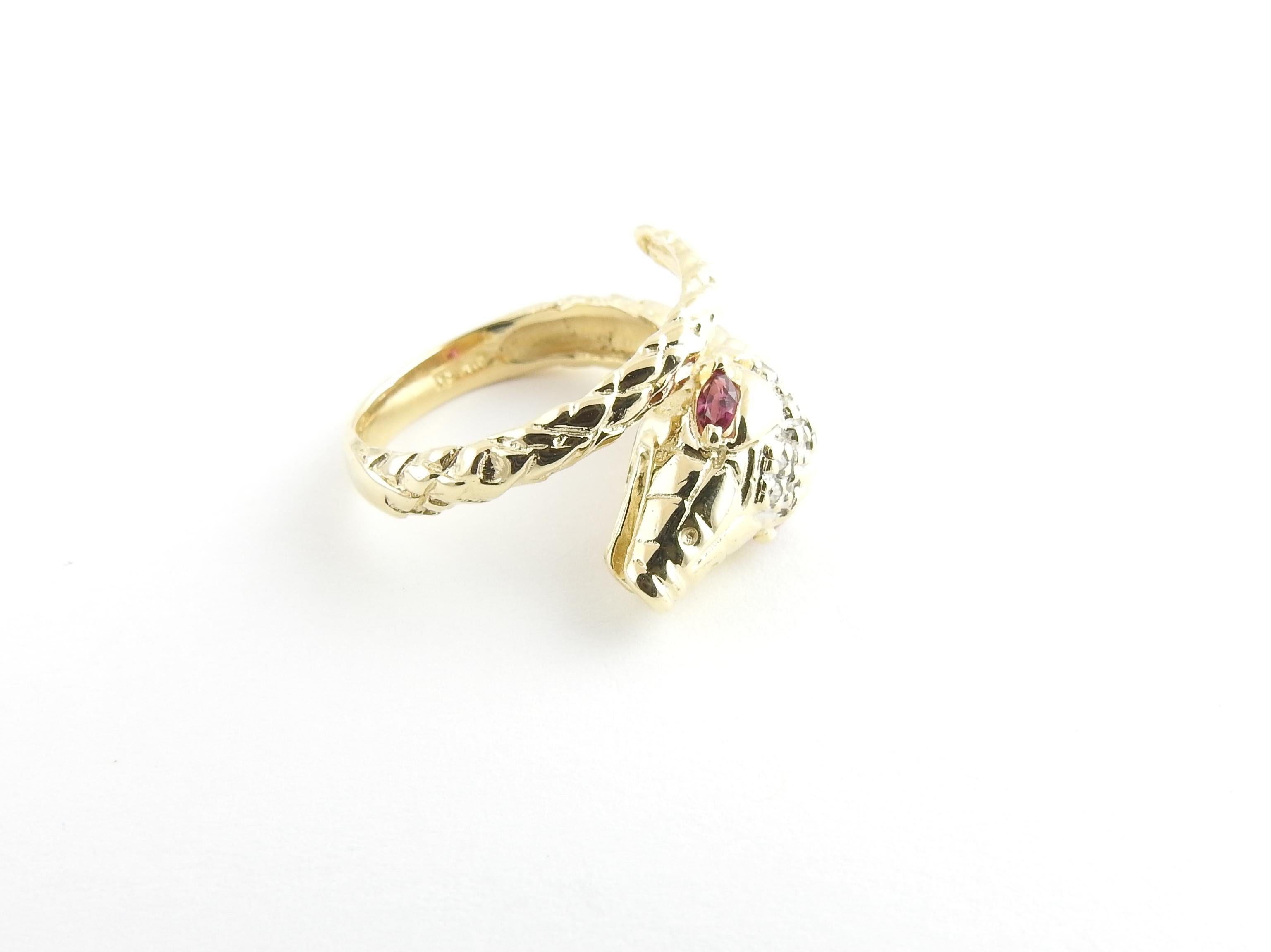 Vintage 14 Karat Yellow Gold Ruby and Diamond Snake Ring Size 6.5

This stunning snake ring features eight round single cut diamonds and two marquis rubies set in beautifully detailed 14K yellow gold.

Width: 11 mm. Shank: 3 mm.

Approximate total
