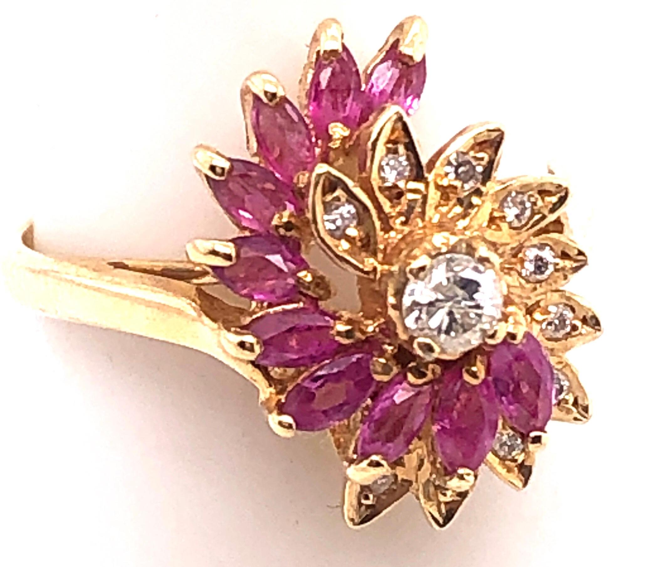 14 Karat Yellow Gold Fashion Ring with Ruby Stones and Diamonds.
0.24 Total diamond weight.
Size 5
2.82 grams total weight.
