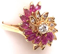 14 Karat Yellow Gold Ruby and Diamond Swirl Ring