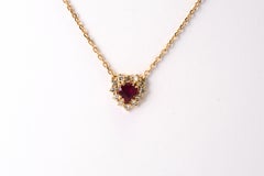 Collar de oro amarillo de 14 quilates con rubíes y diamantes