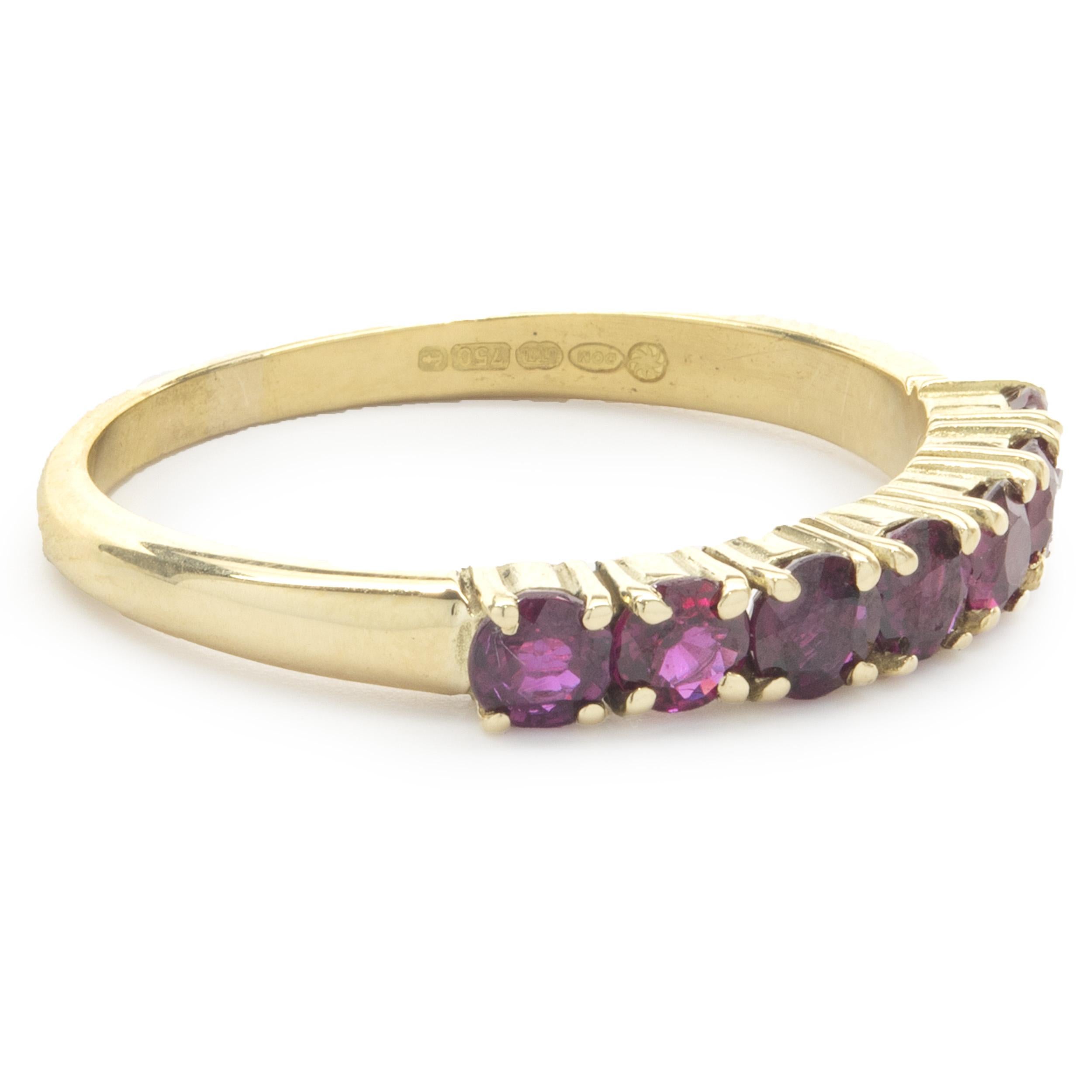 Designer: custom
Material: 14K yellow gold
Ruby: 7 round cut = 1.40cttw
Dimensions: ring top measures 3.32mm wide
Ring Size: 8.75 (complimentary sizing available)
Weight: 3.33 grams