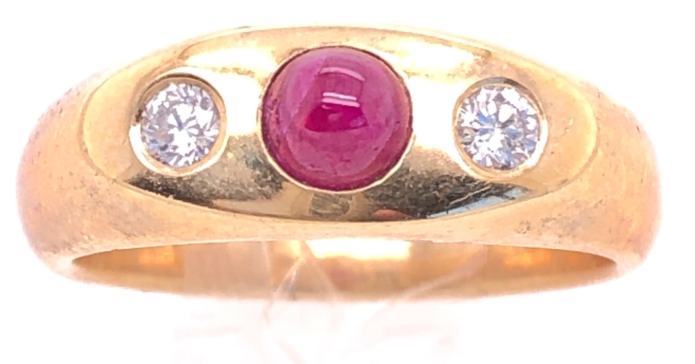 14 Karat Yellow Gold Ruby Cabochon Solitaire With Diamond Accents Ring Size 8.5.
 2 diamonds with 0.25 total diamond weight.
1 round ruby
9 grams total weight.
