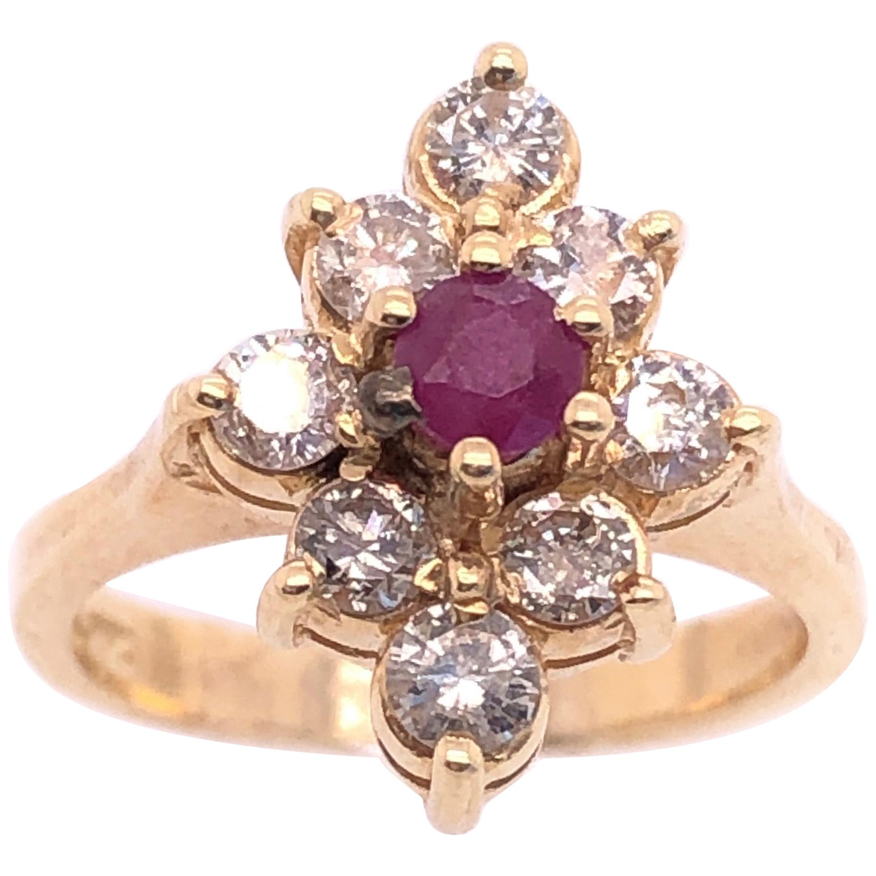 14 Karat Yellow Gold Ruby Center Framed In Diamonds Ring