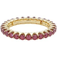 14 Karat Yellow Gold Ruby Eternal Fit Eternity Band Features 1.48 Carat of Red
