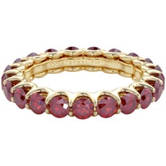14 Karat Yellow Gold Ruby Eternal Fit Eternity Band Features 3.26 Carat of Red