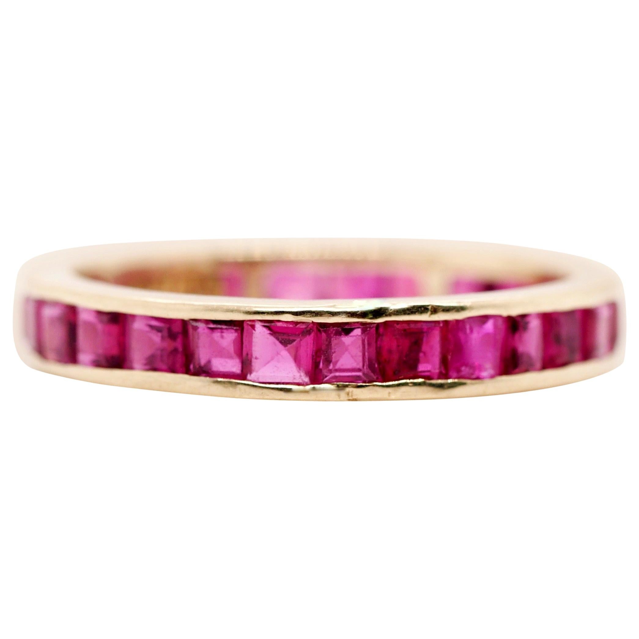 14 Karat Yellow Gold Ruby Eternity Band For Sale