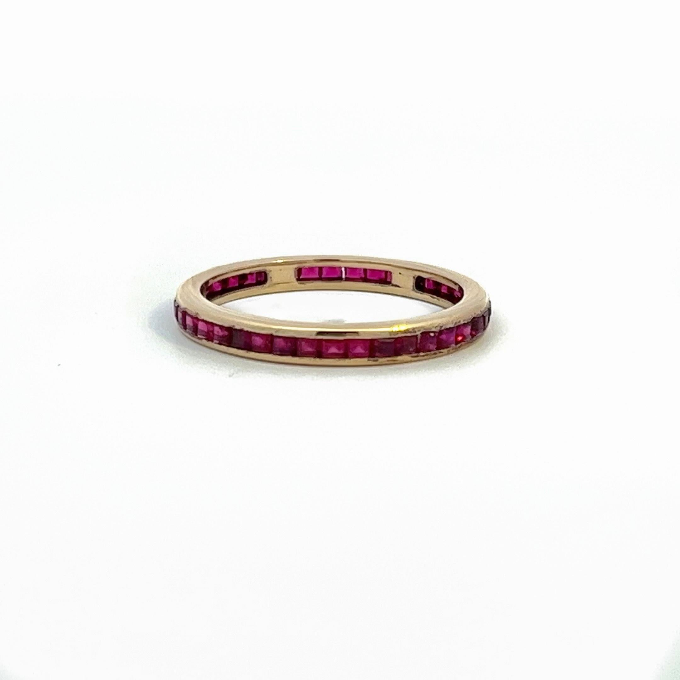 Vintage Retro 14 Karat Yellow Gold French Cut Ruby Eternity Band .80 Carats In Fair Condition For Sale In Fairfield, CT