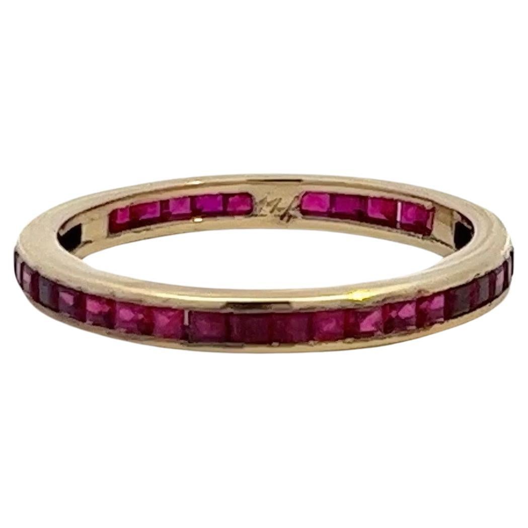 Vintage Retro 14 Karat Yellow Gold French Cut Ruby Eternity Band .80 Carats For Sale