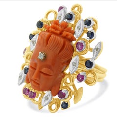 14 Karat Yellow Gold Ruby, Sapphire, Diamond, and Carved Coral Buddha Ring